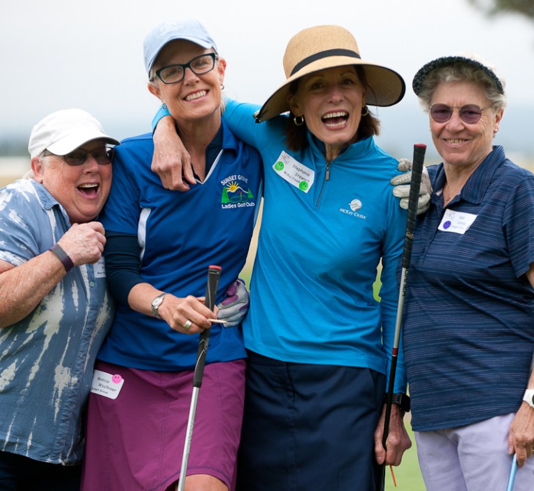 Golfers having fun together on golf course